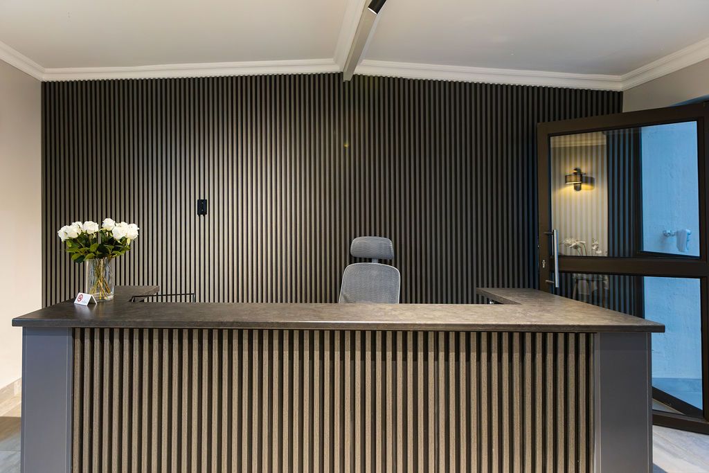 Reception desk with fresh white roses