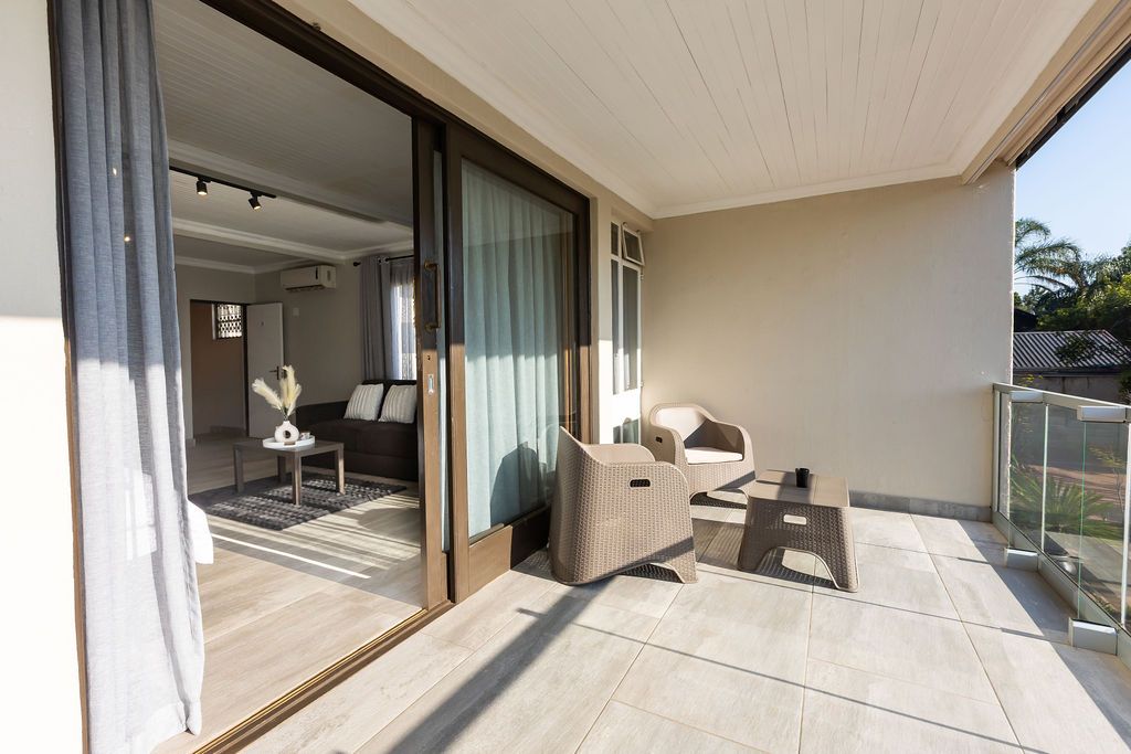 Bedroom opening onto a private paved terrace